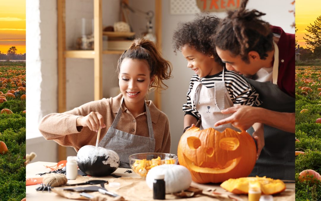 Mom, Dad, and Son carving and painting pumpkins together at a dining room table. Background image showing pumpkin patch at sunset. #People of Color